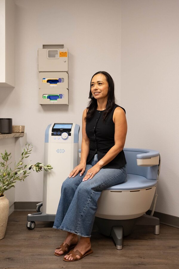 Patient receiving Emsella pelvic floor strengthening treatment at Parker Medical Las Vegas