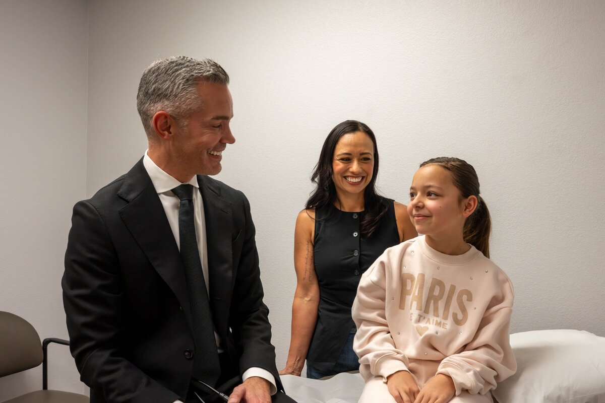 Dr. Ryon Parker MD MBA with mother and daughter during family medicine visit at Parker Medical Las Vegas