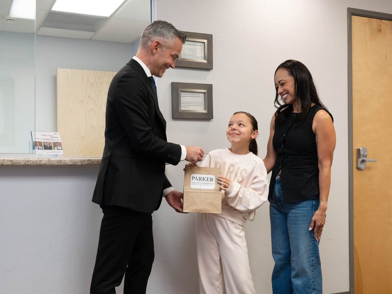 Dr. Parker with family in lobby