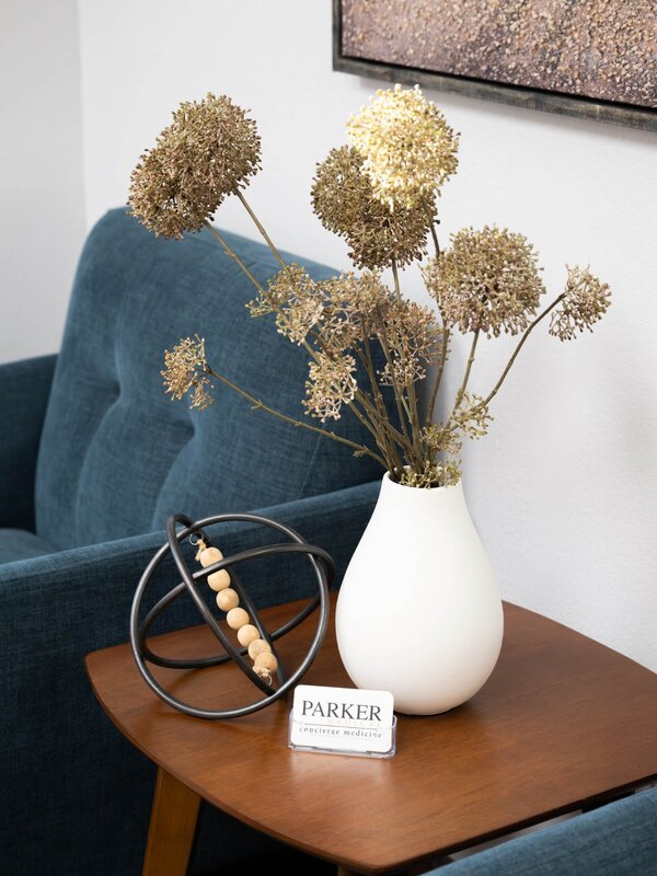 Parker Medical branded business card and elegant lounge decor Las Vegas