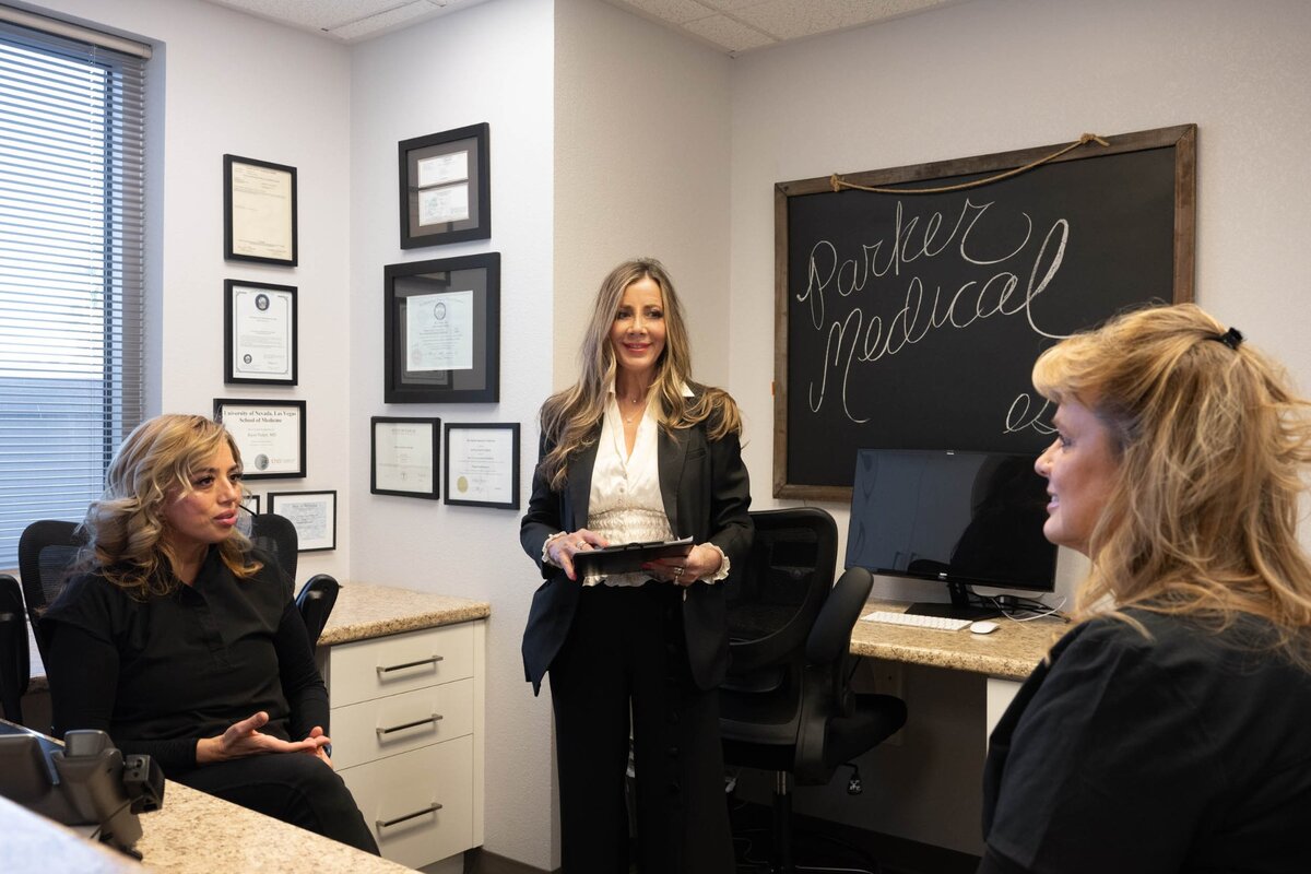 Parker Medical team meeting discussing patient care in Las Vegas office